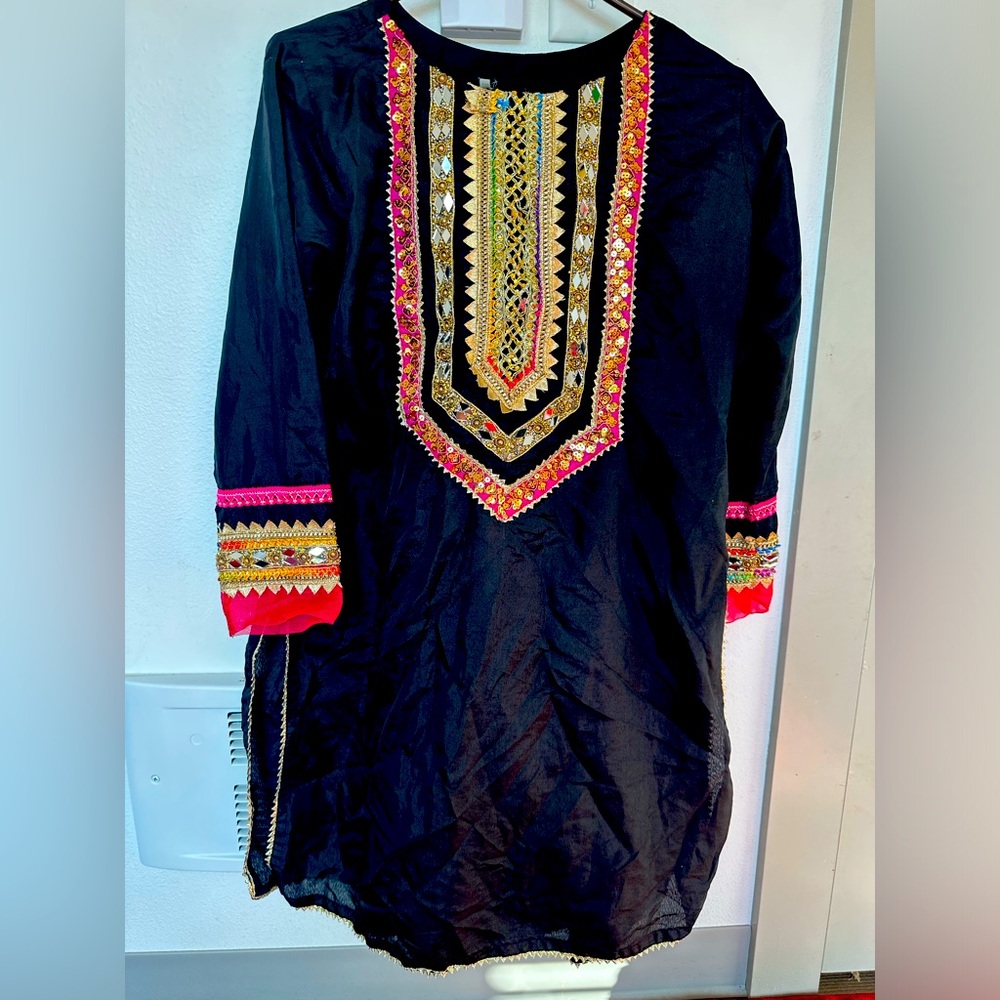 Medium size dress black and pink in color